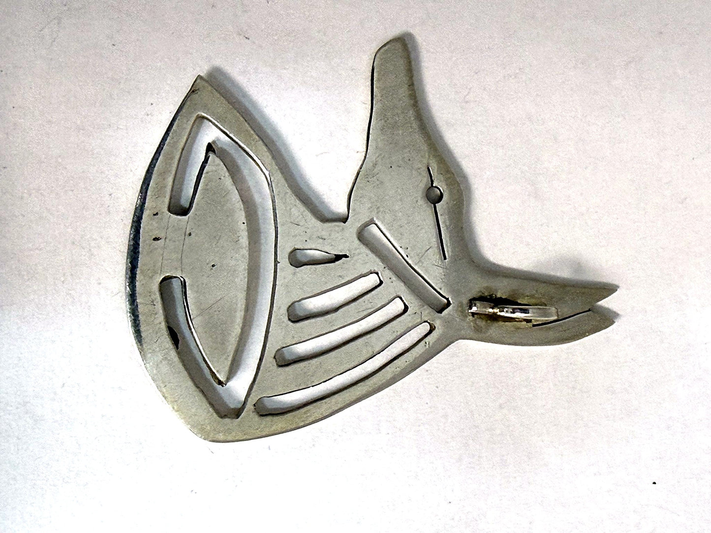 Hand-finished pierced back of the Anubis pendant