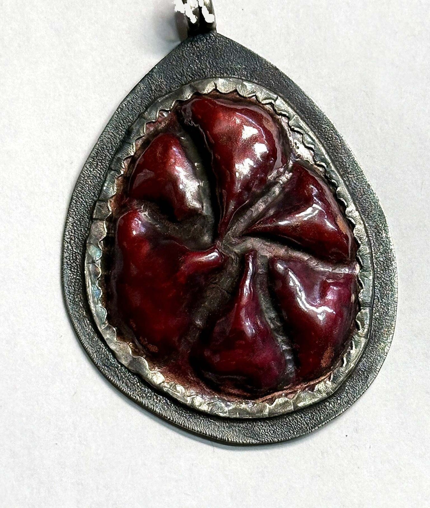 Repousse copper teardrop pendant, front