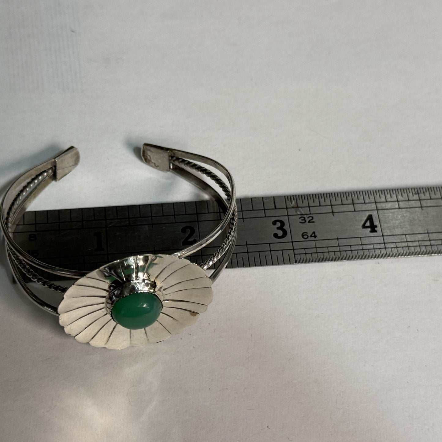 Sterling silver chrysoprase cuff shown for scale