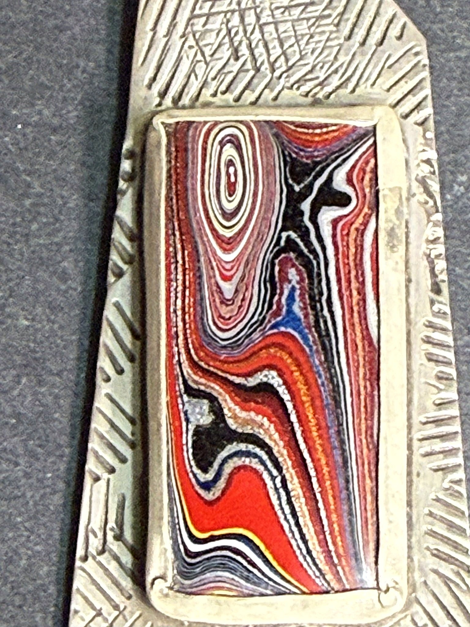 Macro detail of the layered fordite bands